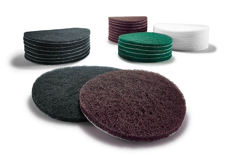 A collection of different sanding vlies attachments