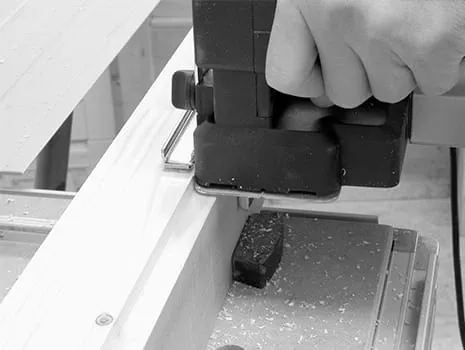 Placing the planer foot edge on the rebate edge