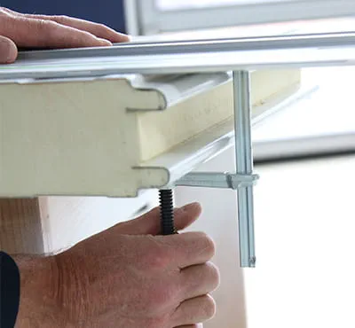 Securing the material using clamps