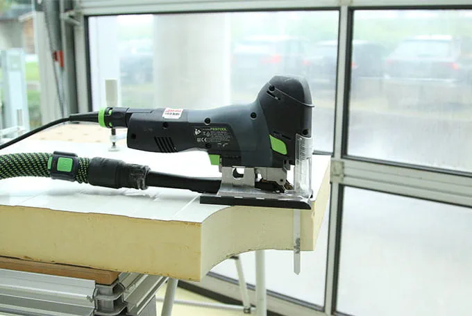 Sawing composite panels