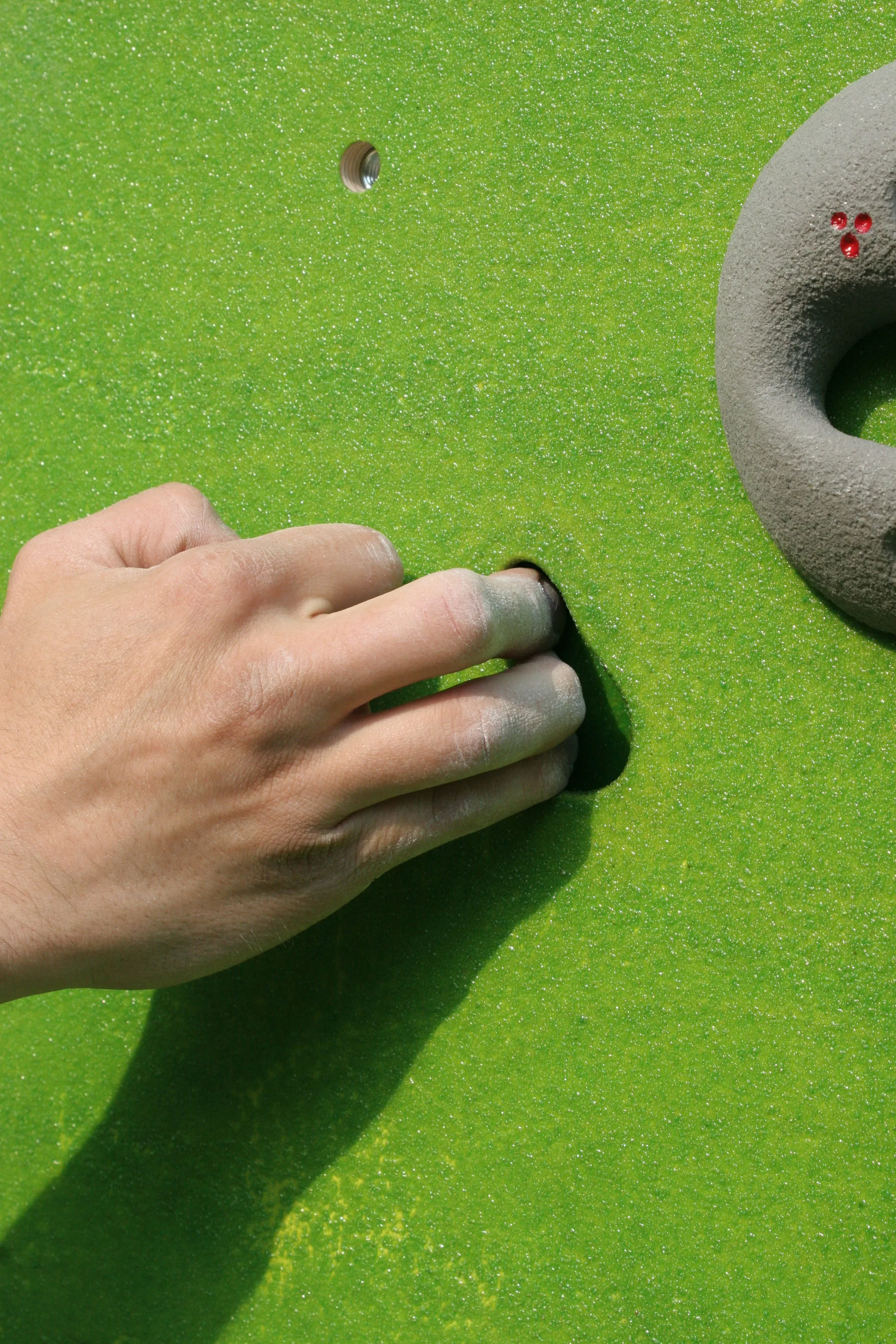 Handle for a climbing wall