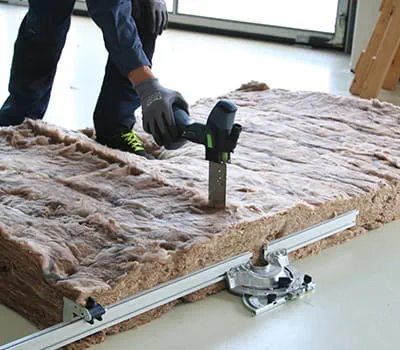 Cutting insulation between rafters