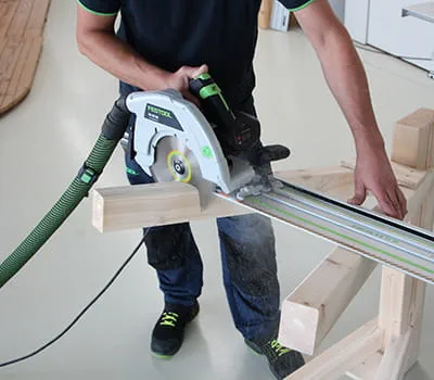 Shorten the legs using the portable circular saw and cross cutting guide rail
