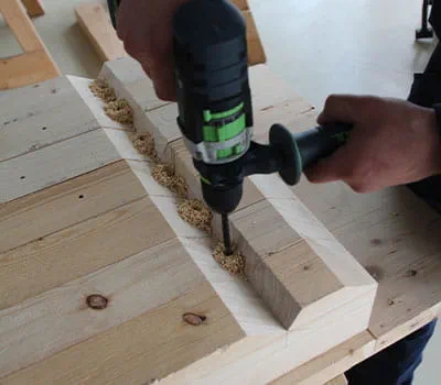 Holes in the bird's mouth notch corner to secure the rafters