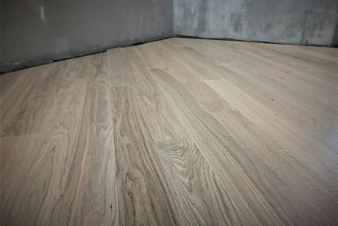 Laying wooden floorboards
