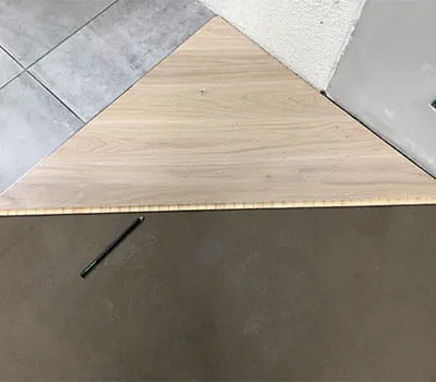 Cutting a triangle for the first corner
