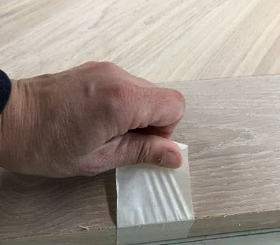Attaching adhesive strips
