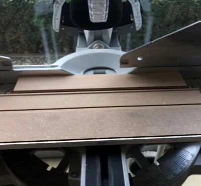 Place the workpiece on the saw