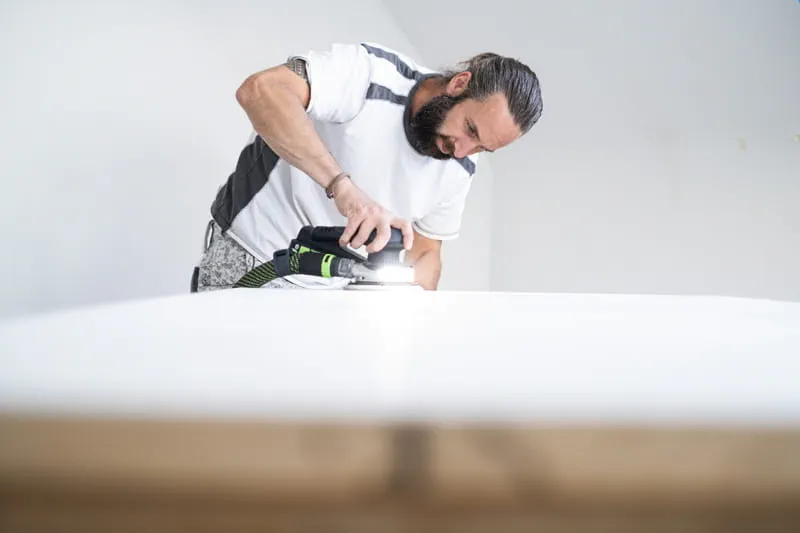 Preparation of a coated wooden door